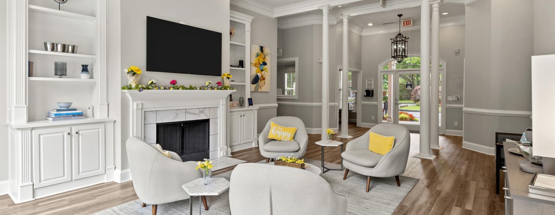lounge room with wooden flooring and spacious seating spots