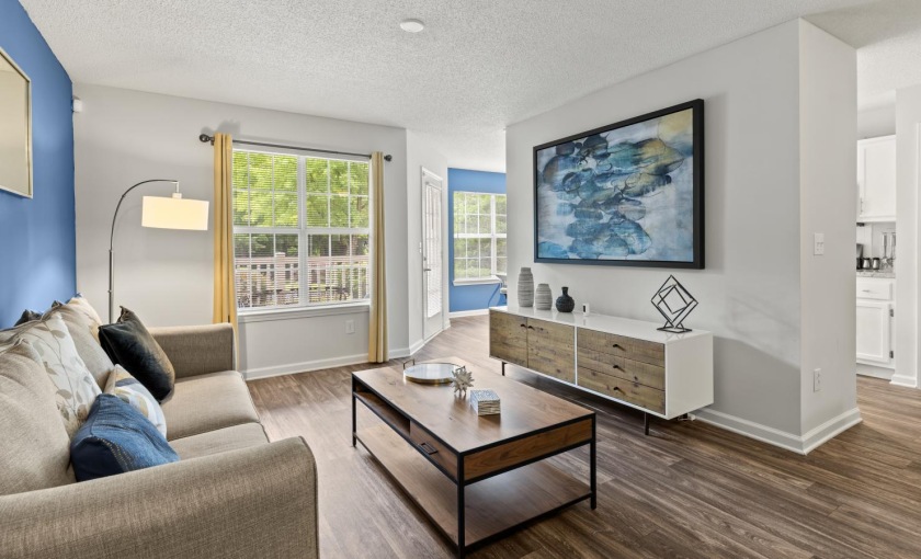 a living room with a wood floor