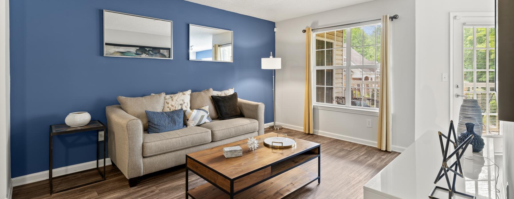 a living room with a couch and a coffee table